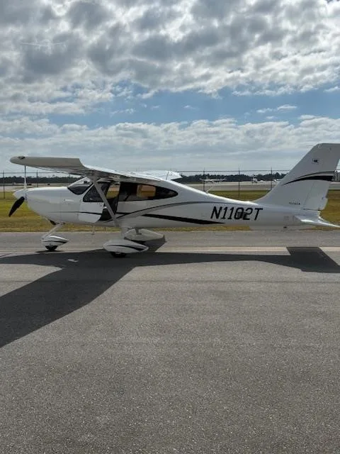 Exterior view of a 2021 TECNAM P2010, N1102T.