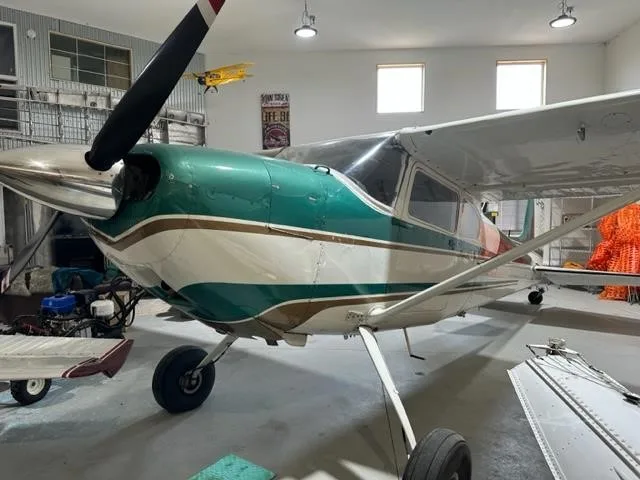 Exterior view of a 1955 CESSNA 180, C-FICR.