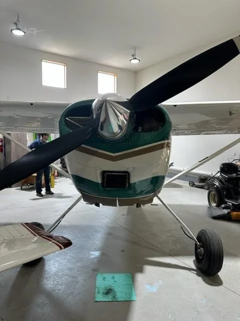 Exterior view of a 1955 CESSNA 180, C-FICR.