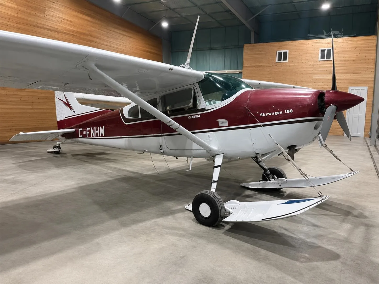 Exterior view of a 1961 CESSNA 185 FLOATPLANE, C-FNHM.