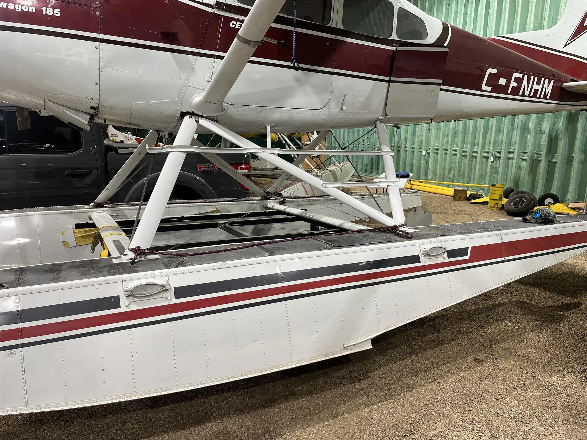 Exterior view of a 1961 CESSNA 185 FLOATPLANE, C-FNHM.