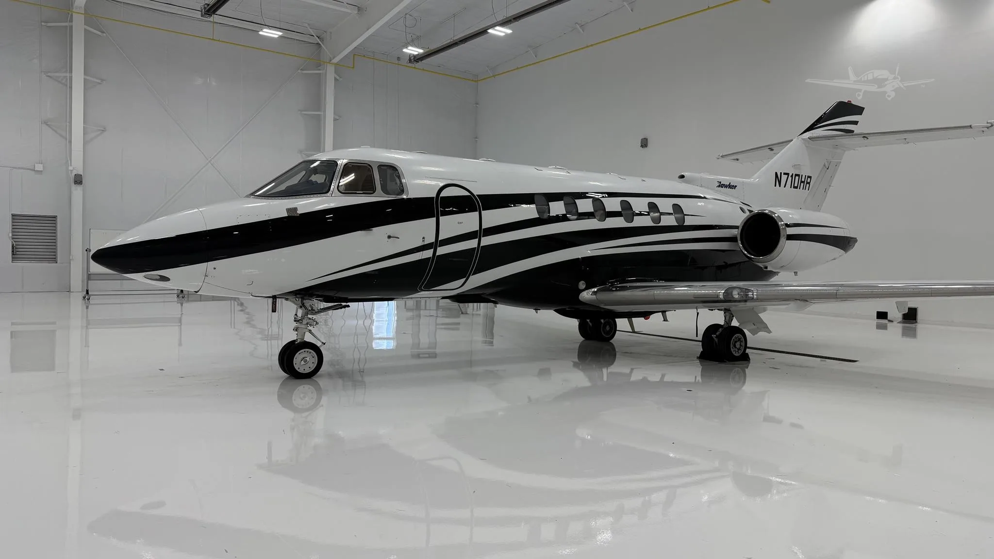 Exterior view of a 1998 HAWKER 800XP, N710HR.