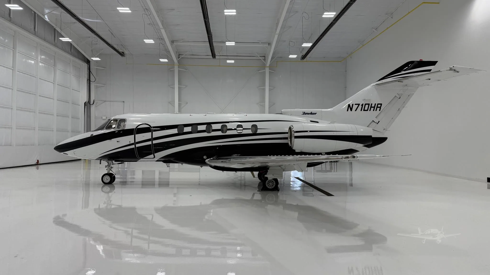 Exterior view of a 1998 HAWKER 800XP, N710HR.