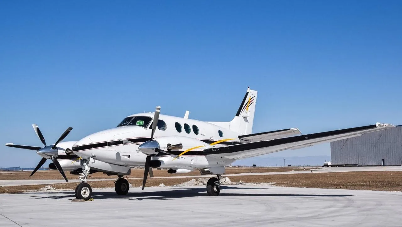 Exterior view of a 1980 BEECHCRAFT KING AIR C90, N385EM.