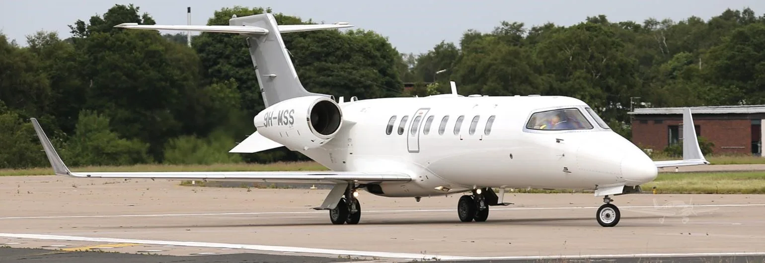 Exterior view of a 2001 LEARJET 45, 9H-MSS.