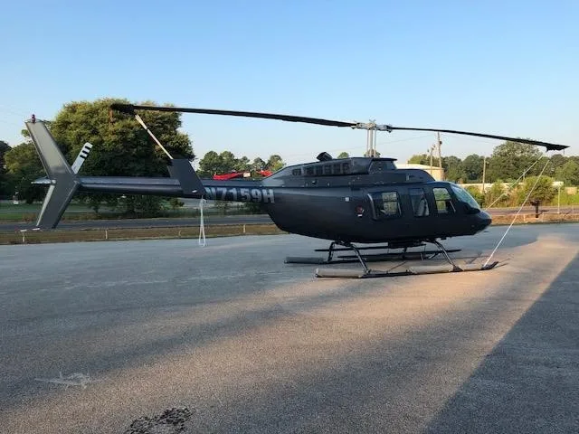 Exterior view of a 1990 BELL 206L-3, N7159H.