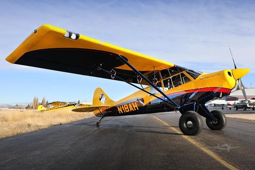 Exterior view of a 2019 AVIAT HUSKY A-1C-180, N18AH.