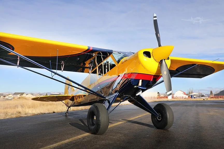 Exterior view of a 2019 AVIAT HUSKY A-1C-180, N18AH.