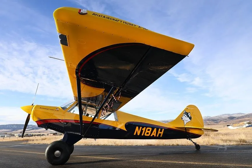 Exterior view of a 2019 AVIAT HUSKY A-1C-180, N18AH.