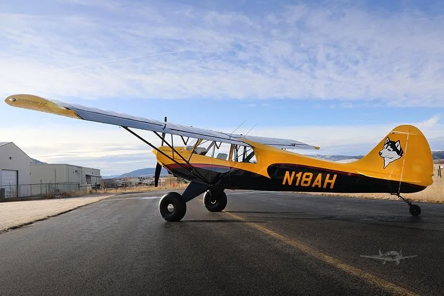 Exterior view of a 2019 AVIAT HUSKY A-1C-180, N18AH.