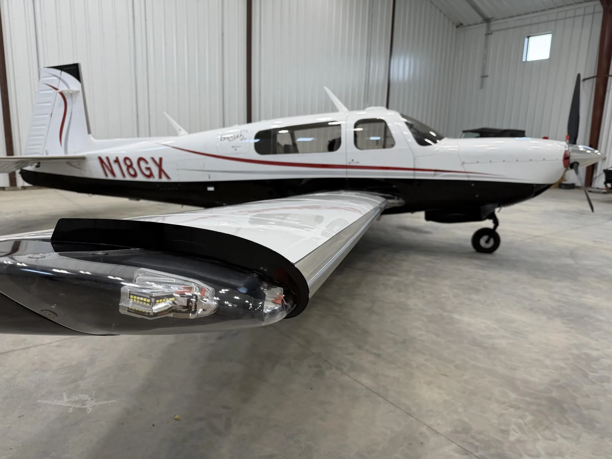 Exterior view of a 2007 MOONEY M20M GX BRAVO, N18GX.
