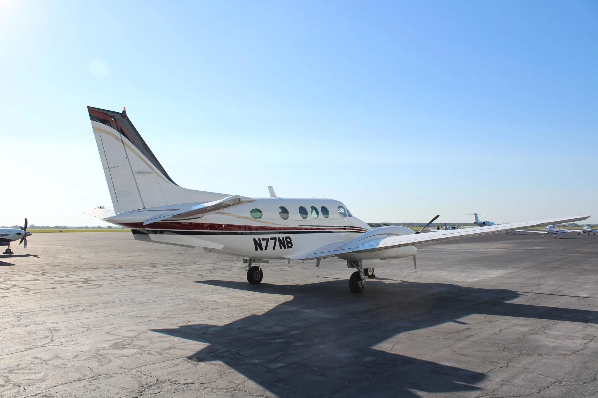 Exterior view of a 1979 BEECHCRAFT KING AIR C90, N77NB.