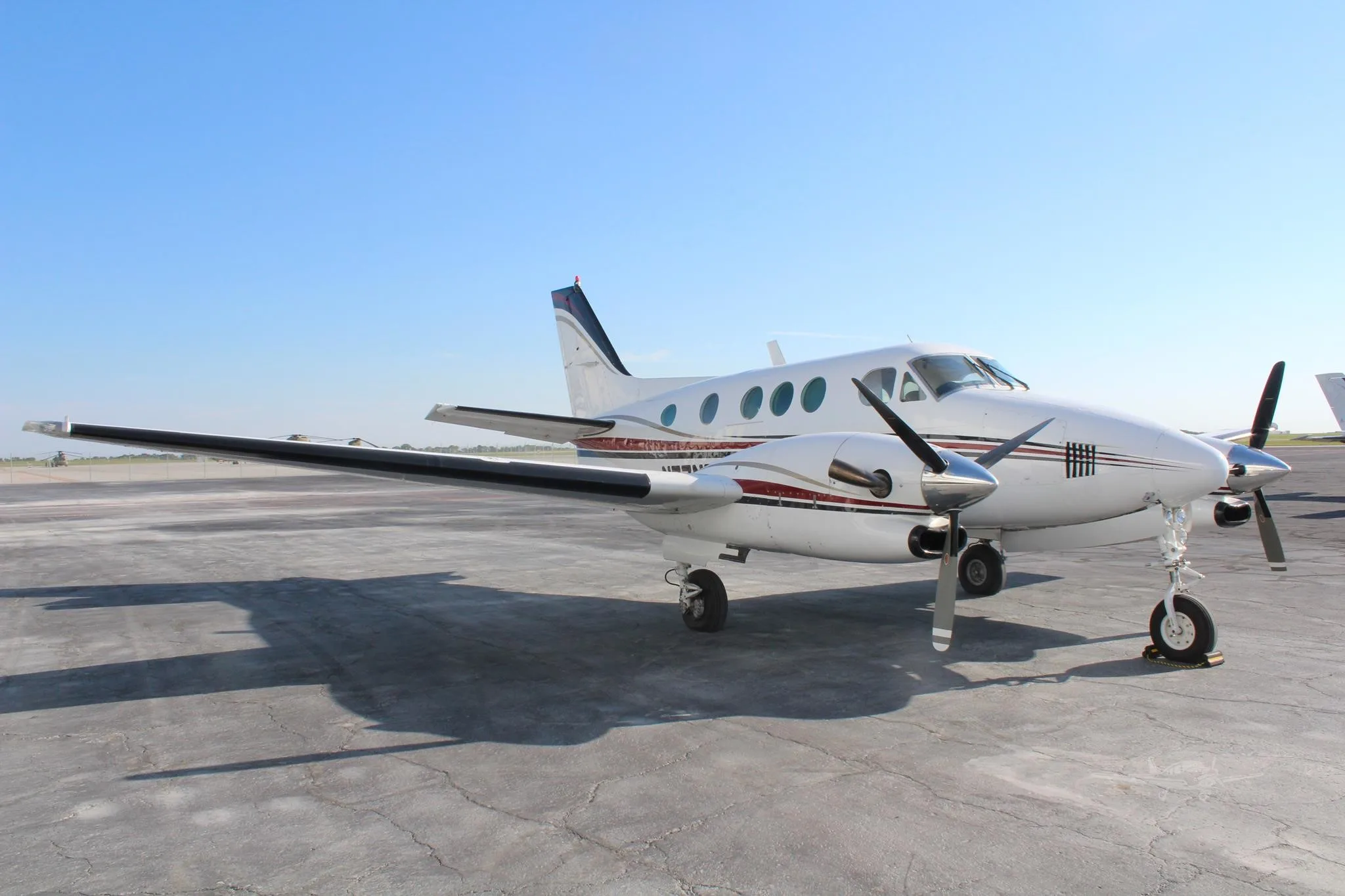 Exterior view of a 1979 BEECHCRAFT KING AIR C90, N77NB.