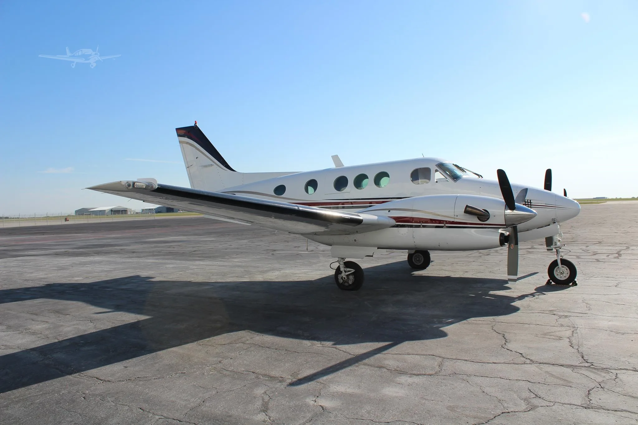 Exterior view of a 1979 BEECHCRAFT KING AIR C90, N77NB.