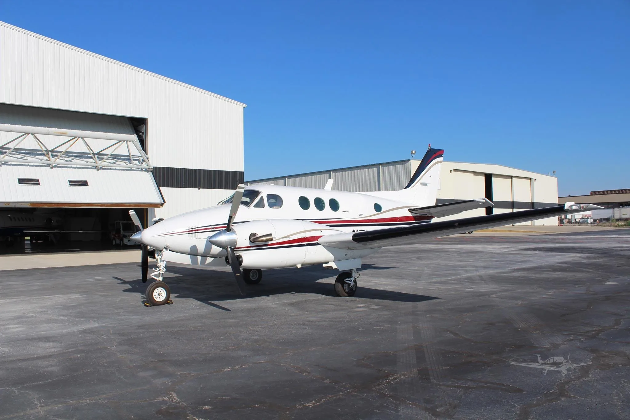 Exterior view of a 1979 BEECHCRAFT KING AIR C90, N77NB.