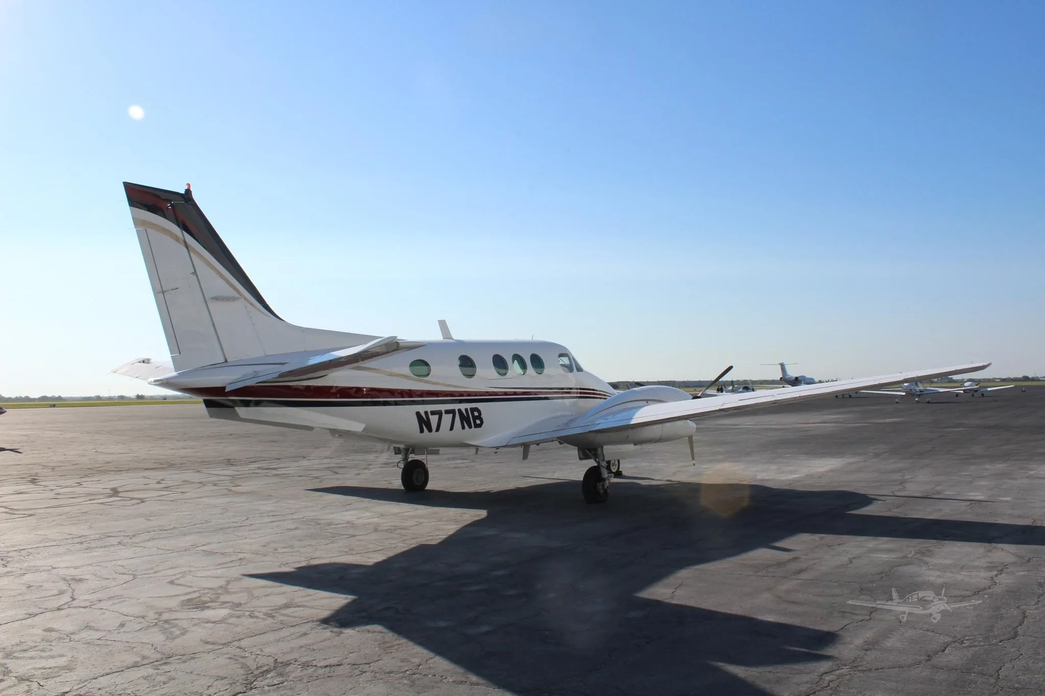 Exterior view of a 1979 BEECHCRAFT KING AIR C90, N77NB.