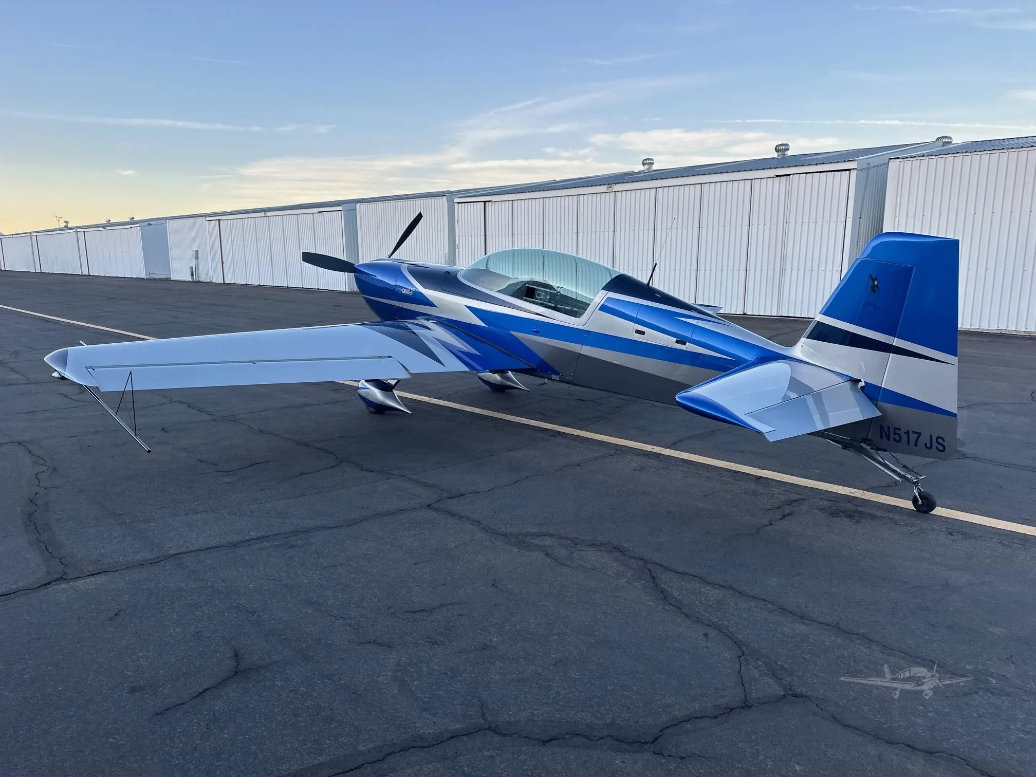 Exterior view of a 2017 EXTRA AIRCRAFT EA 330LT, N517JS.