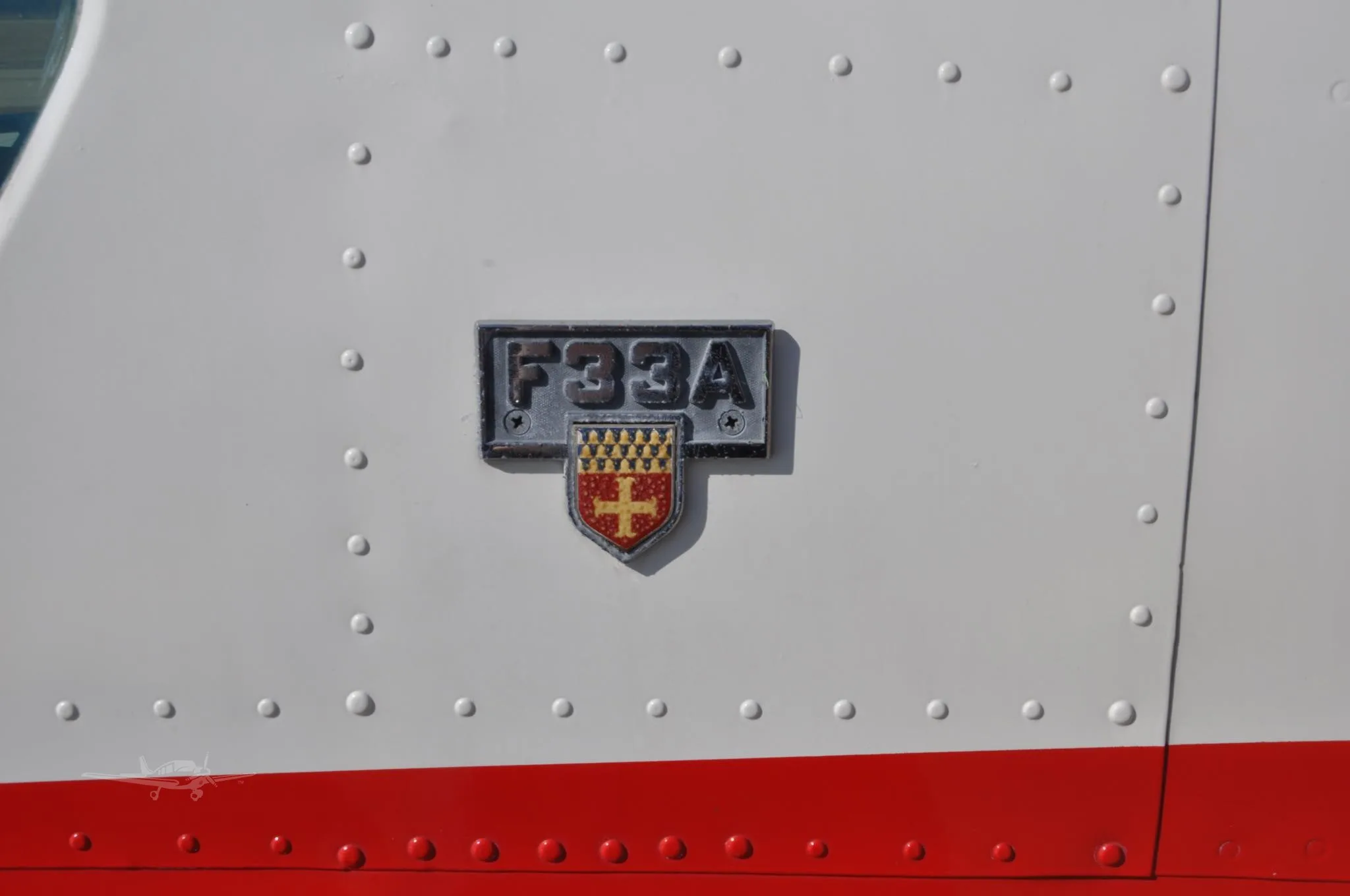 Engine detail of a 1975 BEECHCRAFT F33A BONANZA.