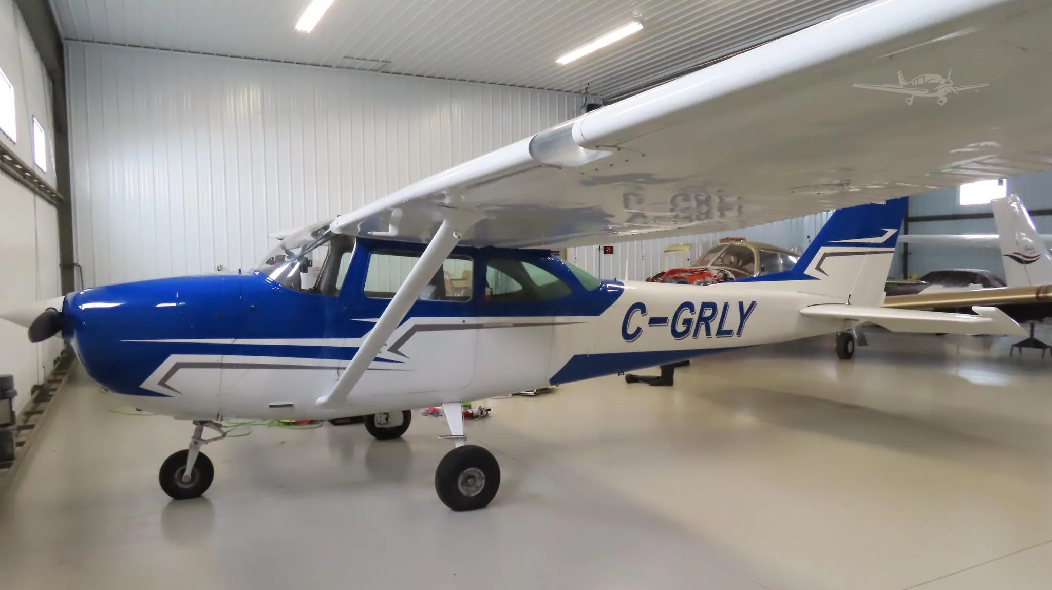 Exterior view of a 1968 CESSNA 172 SKYHAWK, C-GRLY.