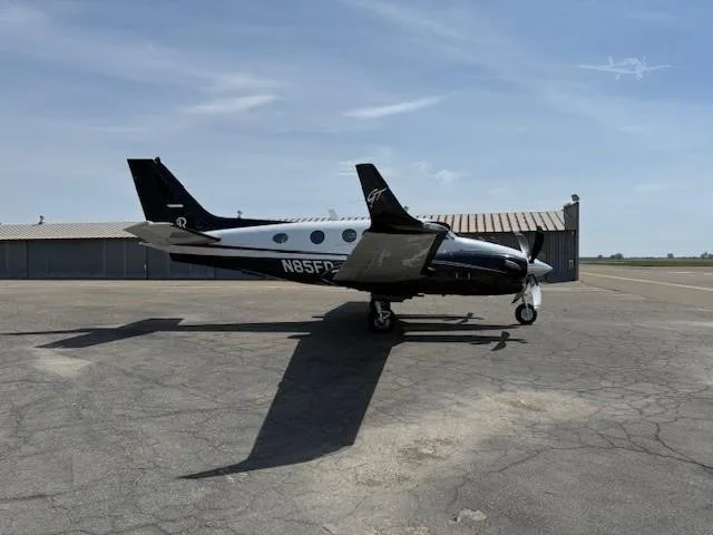 Exterior view of a 2011 BEECHCRAFT KING AIR C90GTI, N85FD.