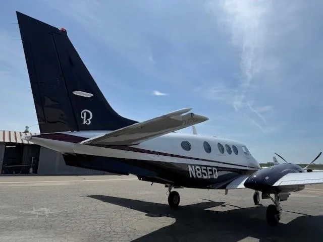 Exterior view of a 2011 BEECHCRAFT KING AIR C90GTI, N85FD.