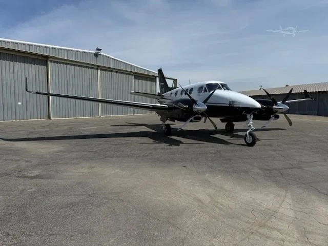 Exterior view of a 2011 BEECHCRAFT KING AIR C90GTI, N85FD.