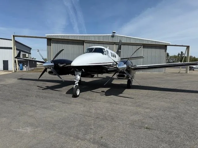 Exterior view of a 2011 BEECHCRAFT KING AIR C90GTI, N85FD.