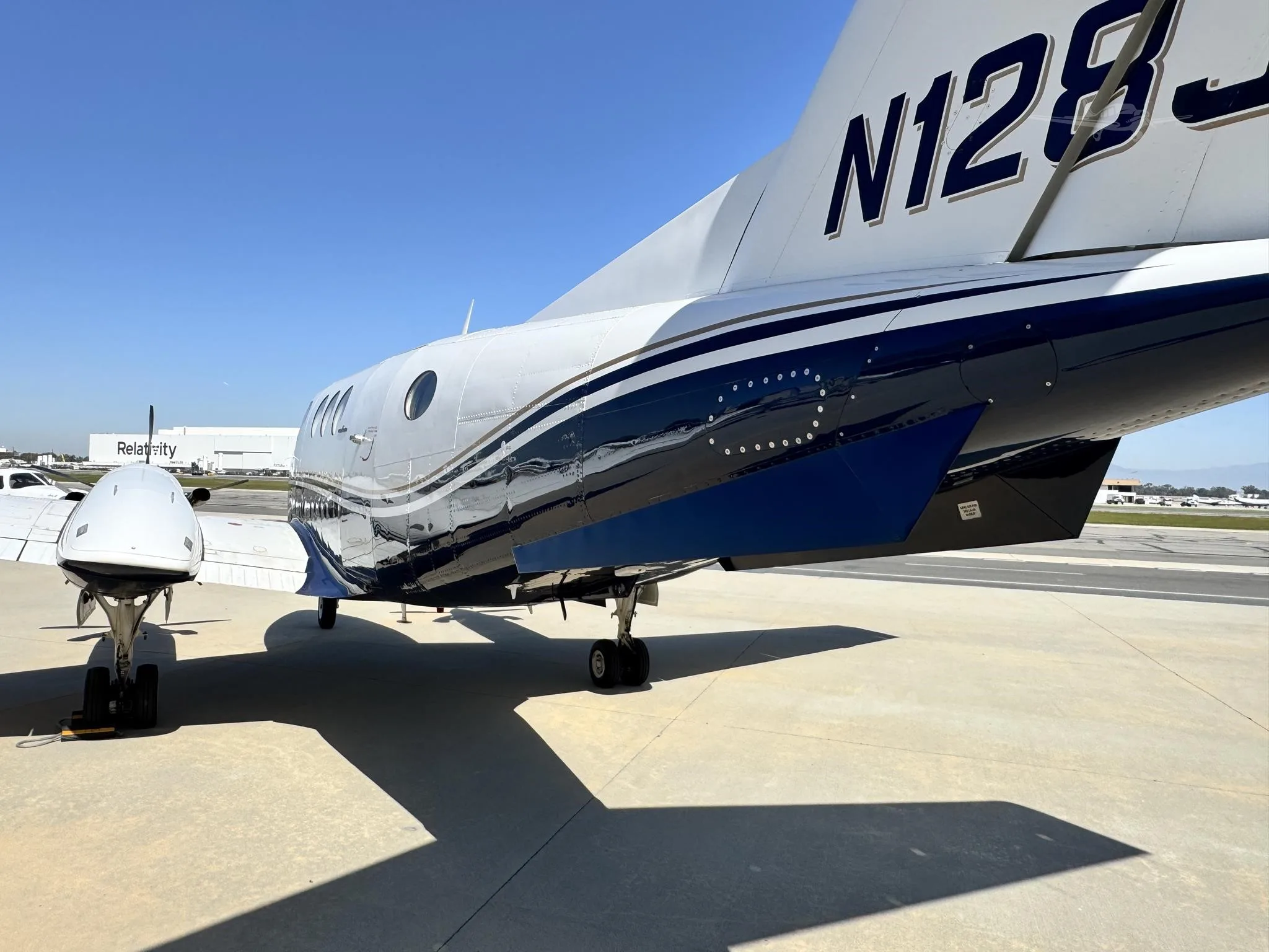 Exterior view of a 1980 BEECHCRAFT KING AIR F90, N128JP.