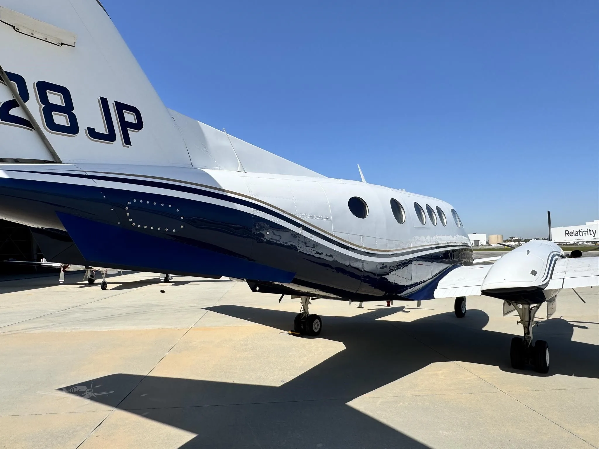 Exterior view of a 1980 BEECHCRAFT KING AIR F90, N128JP.
