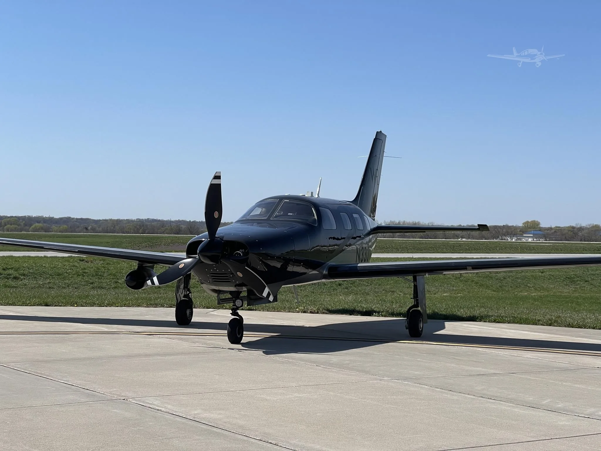 Exterior view of a 2022 PIPER M350, N333WR.