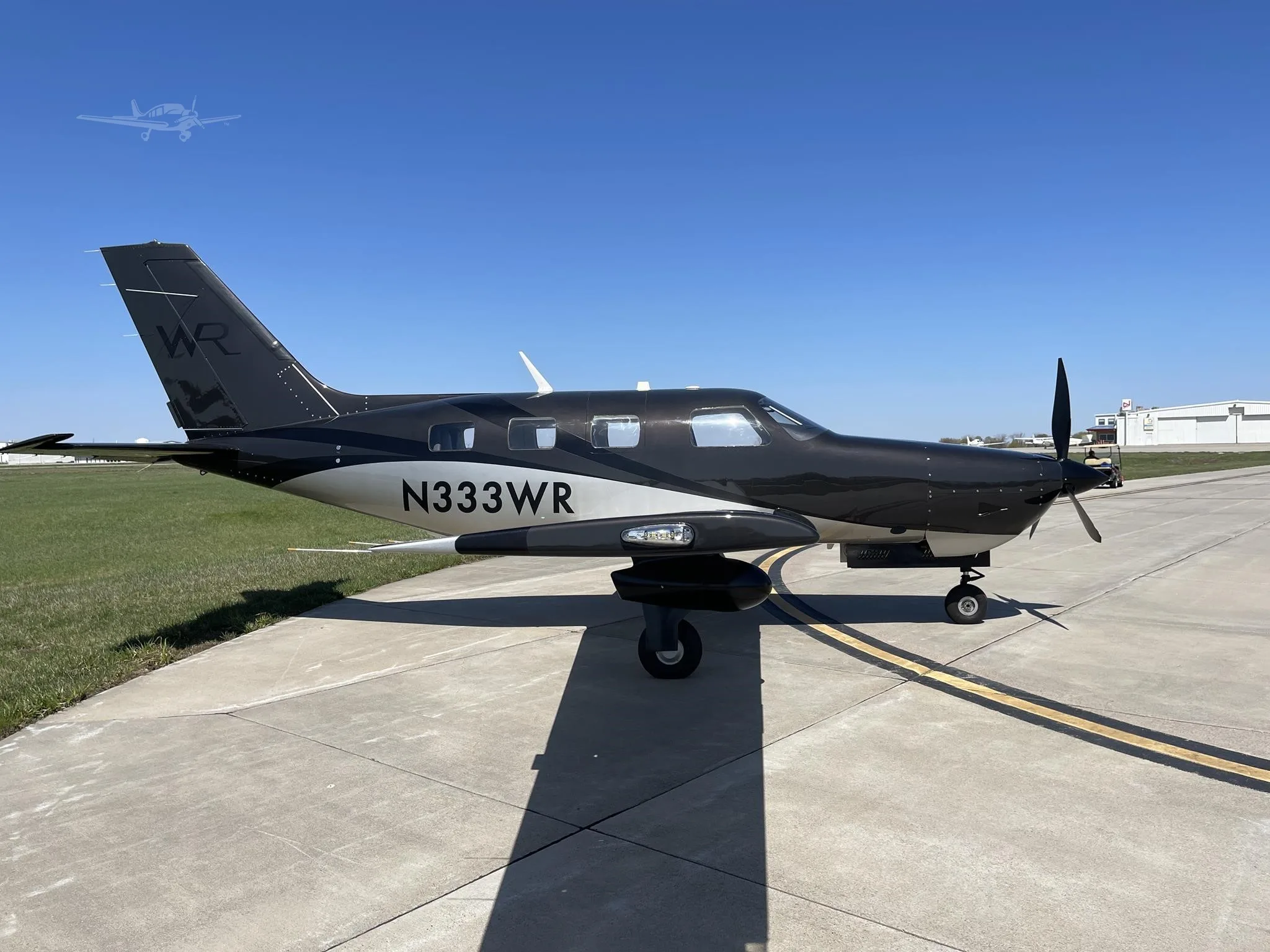 Exterior view of a 2022 PIPER M350, N333WR.