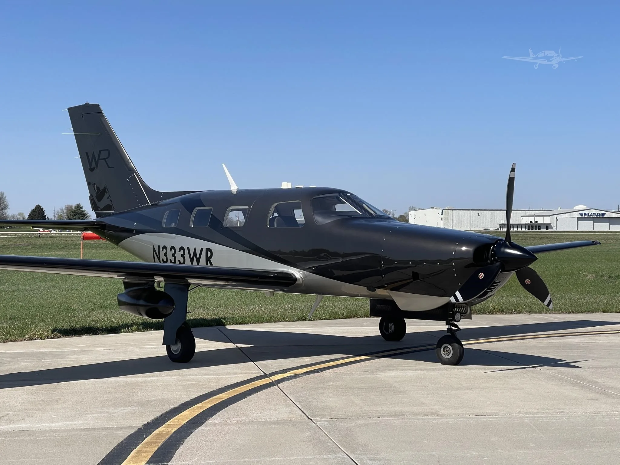 Exterior view of a 2022 PIPER M350, N333WR.