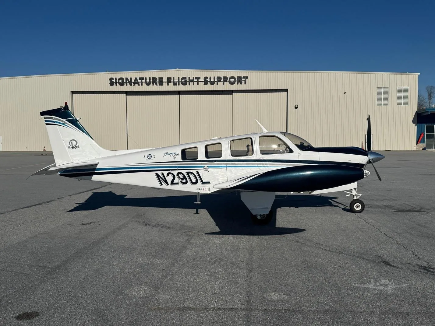 Exterior view of a 1976 BEECHCRAFT A36 BONANZA, N29DL.