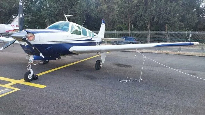 Exterior view of a 1979 BEECHCRAFT A36 BONANZA, 4X-DZD.