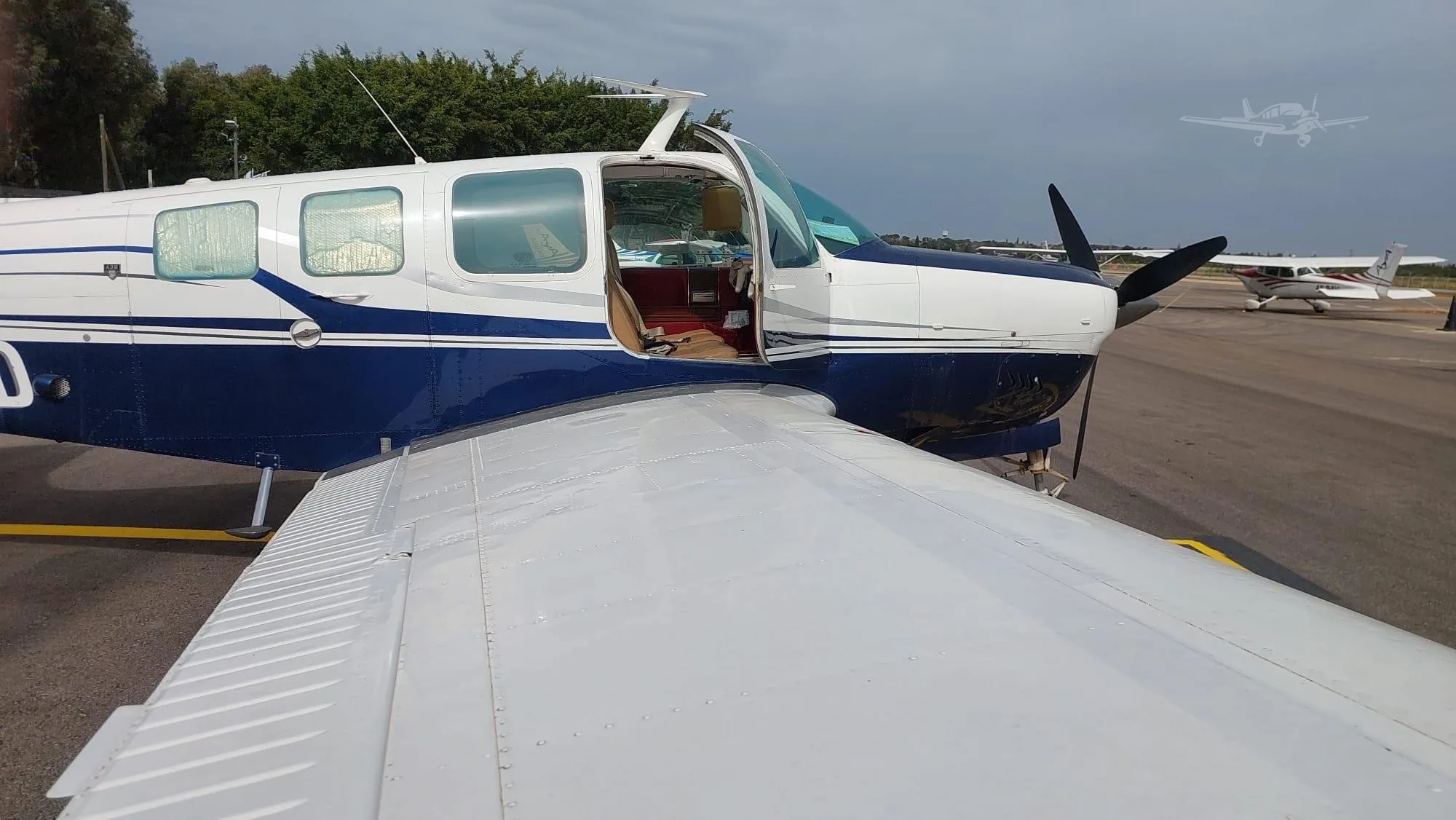Exterior view of a 1979 BEECHCRAFT A36 BONANZA, 4X-DZD.
