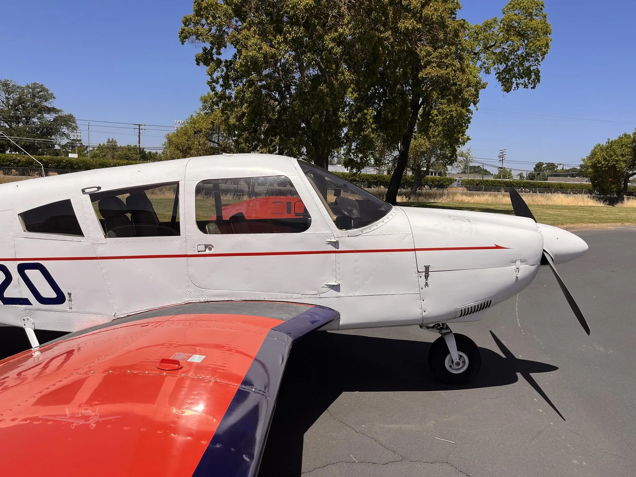 Exterior view of a 1973 PIPER CHEROKEE 180, N16320.