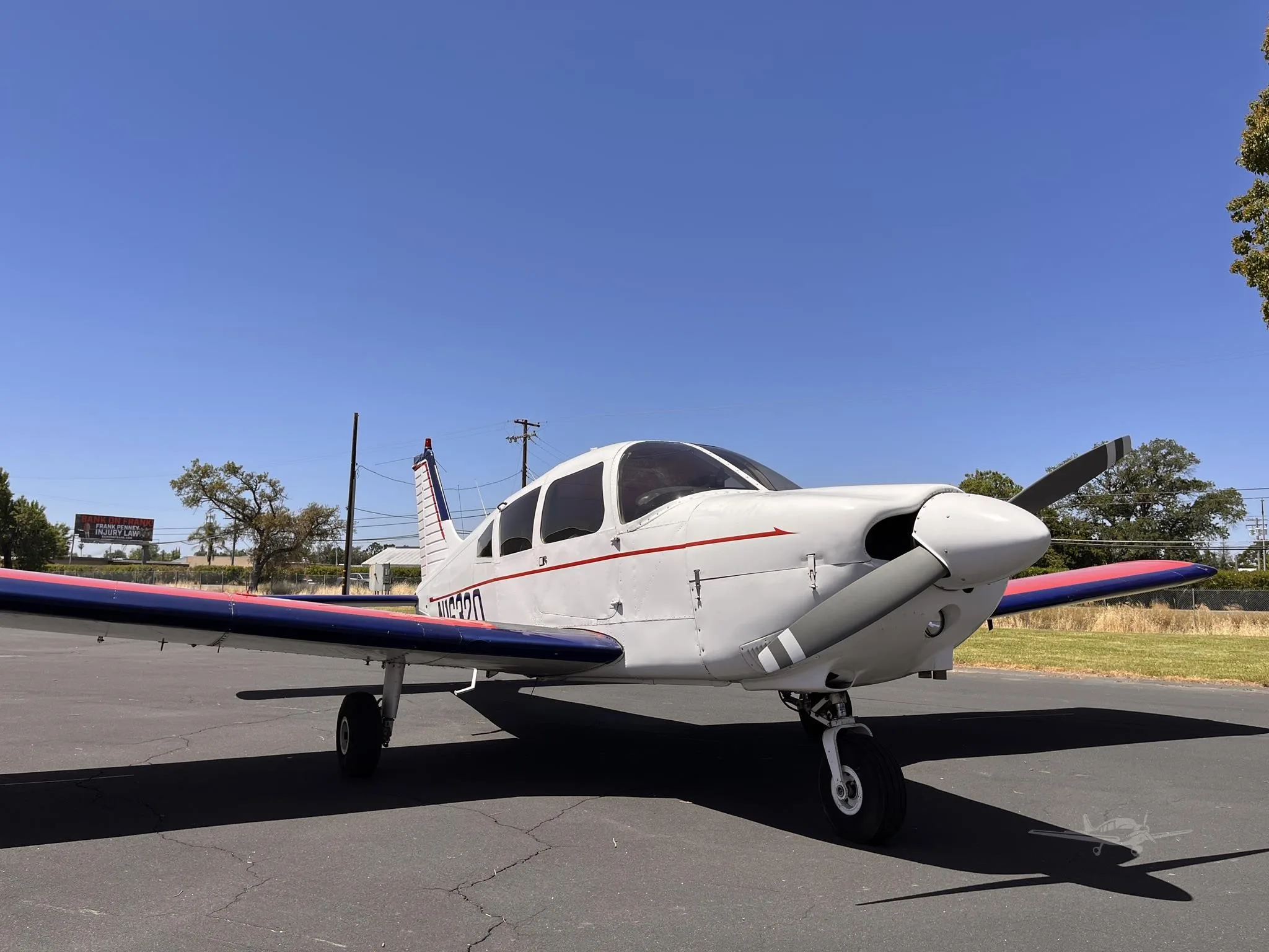 Exterior view of a 1973 PIPER CHEROKEE 180, N16320.