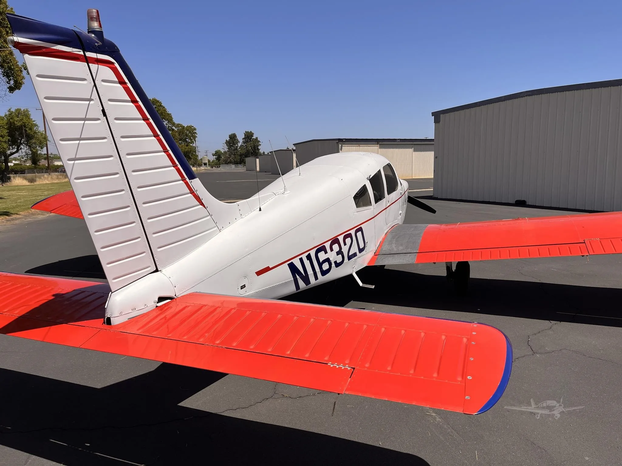 Exterior view of a 1973 PIPER CHEROKEE 180, N16320.