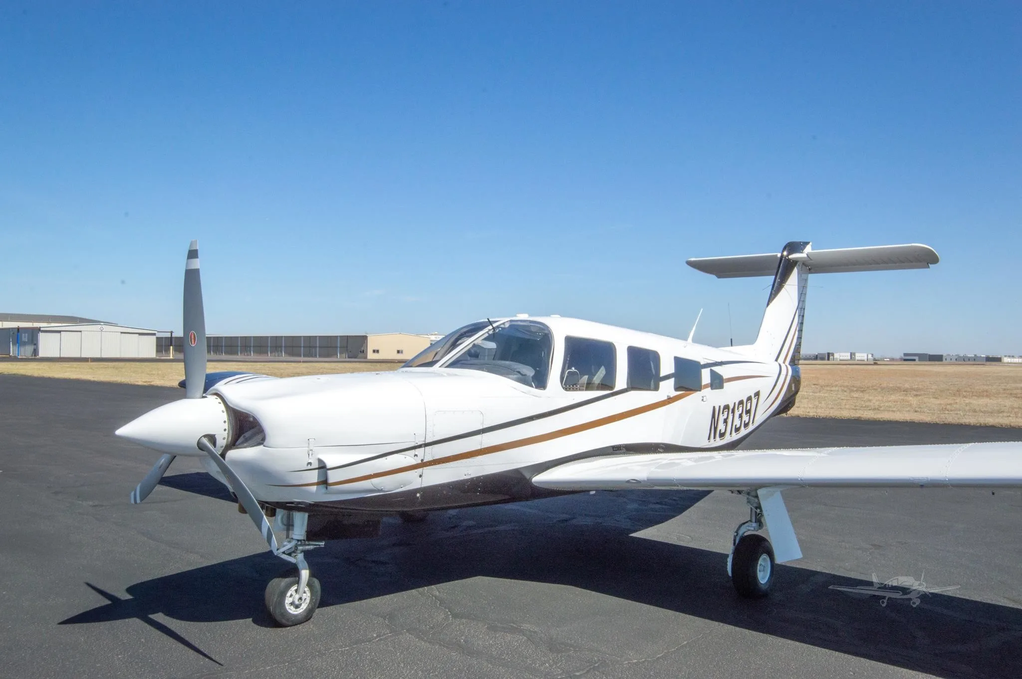 Exterior view of a 1978 PIPER LANCE II, N31397.