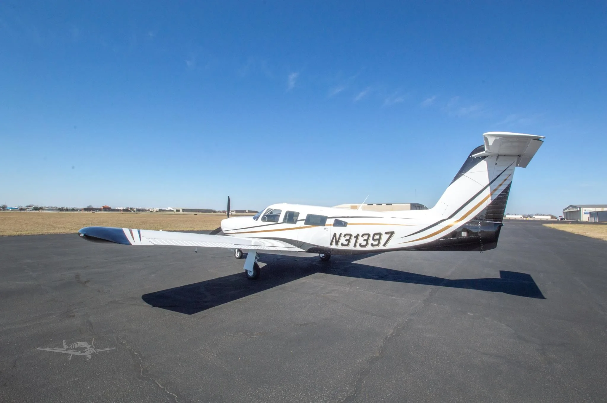 Exterior view of a 1978 PIPER LANCE II, N31397.