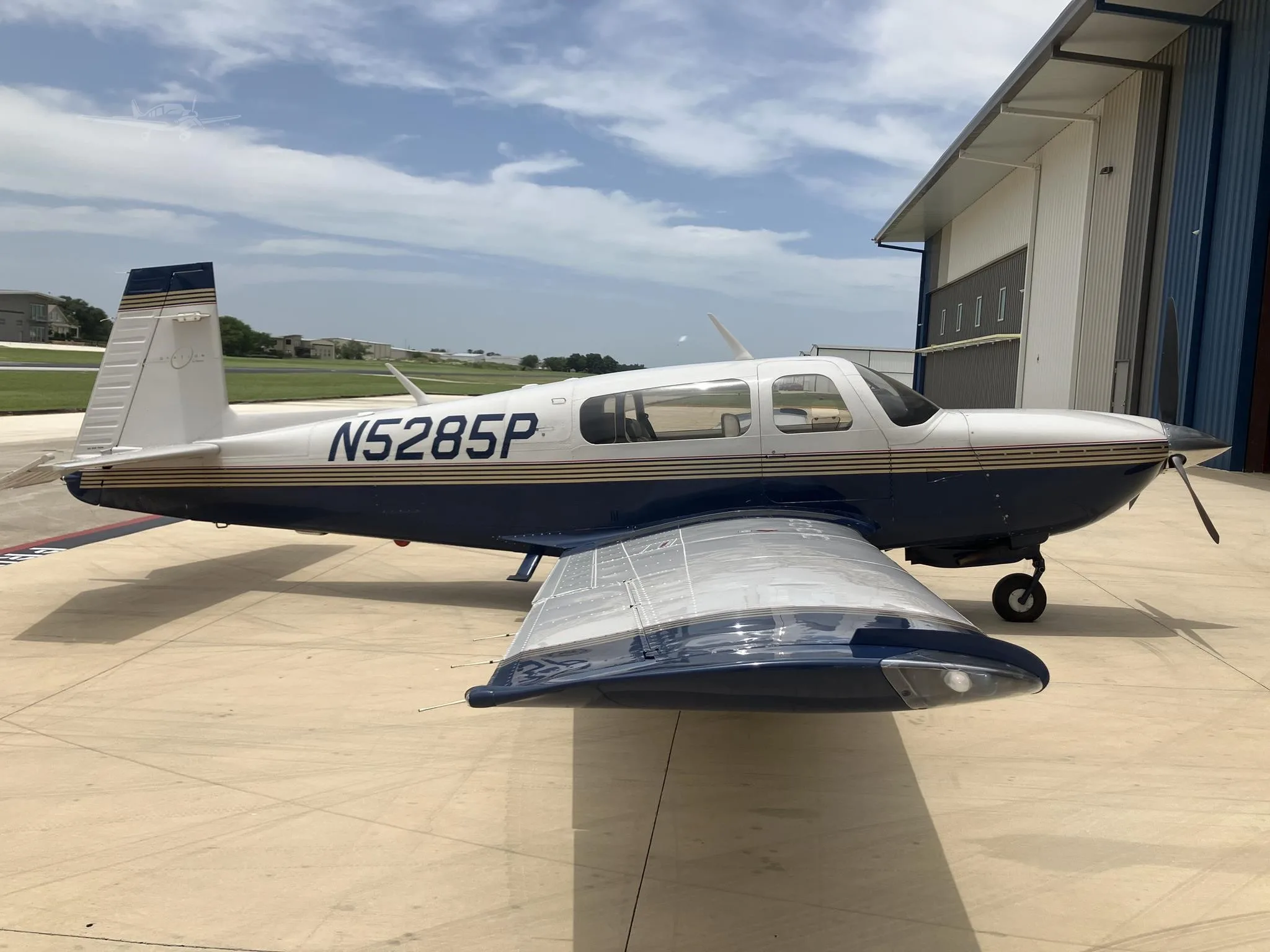 Exterior view of a 1996 MOONEY M20R OVATION, N5285P.