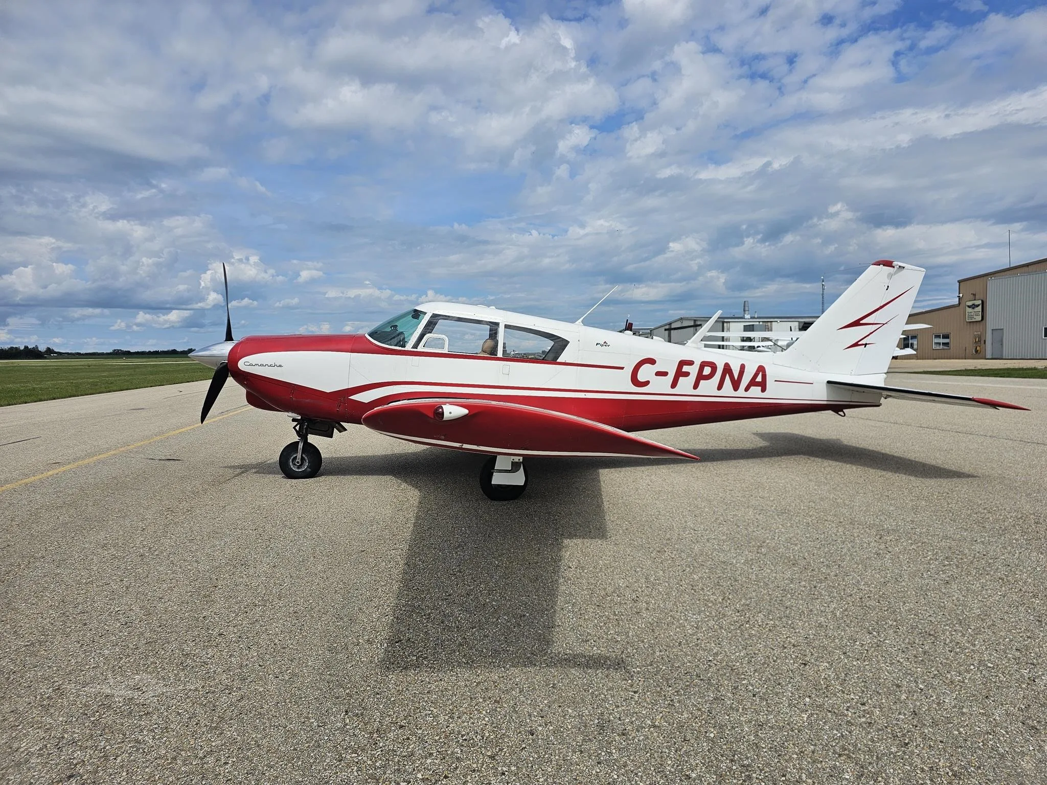 Exterior view of a 1963 PIPER COMANCHE 180, C-FPNA.