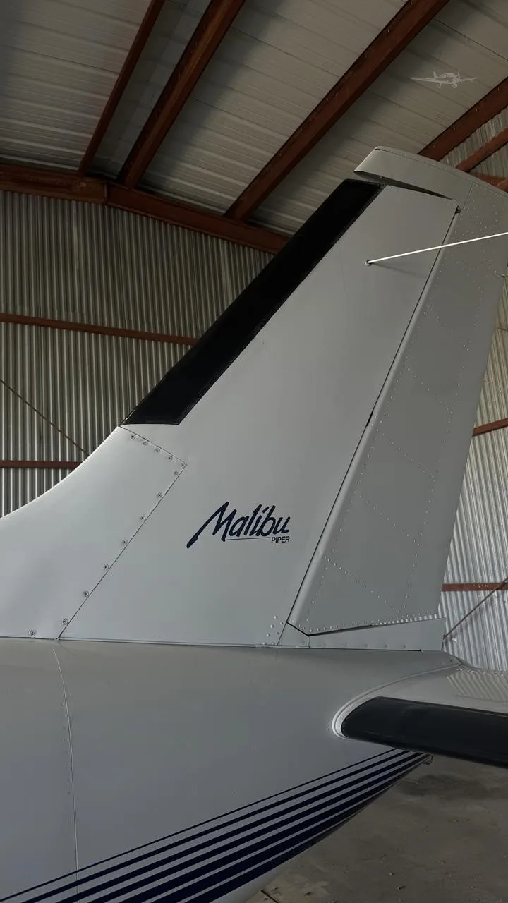 Exterior view of a 1988 PIPER MALIBU, N9146R.