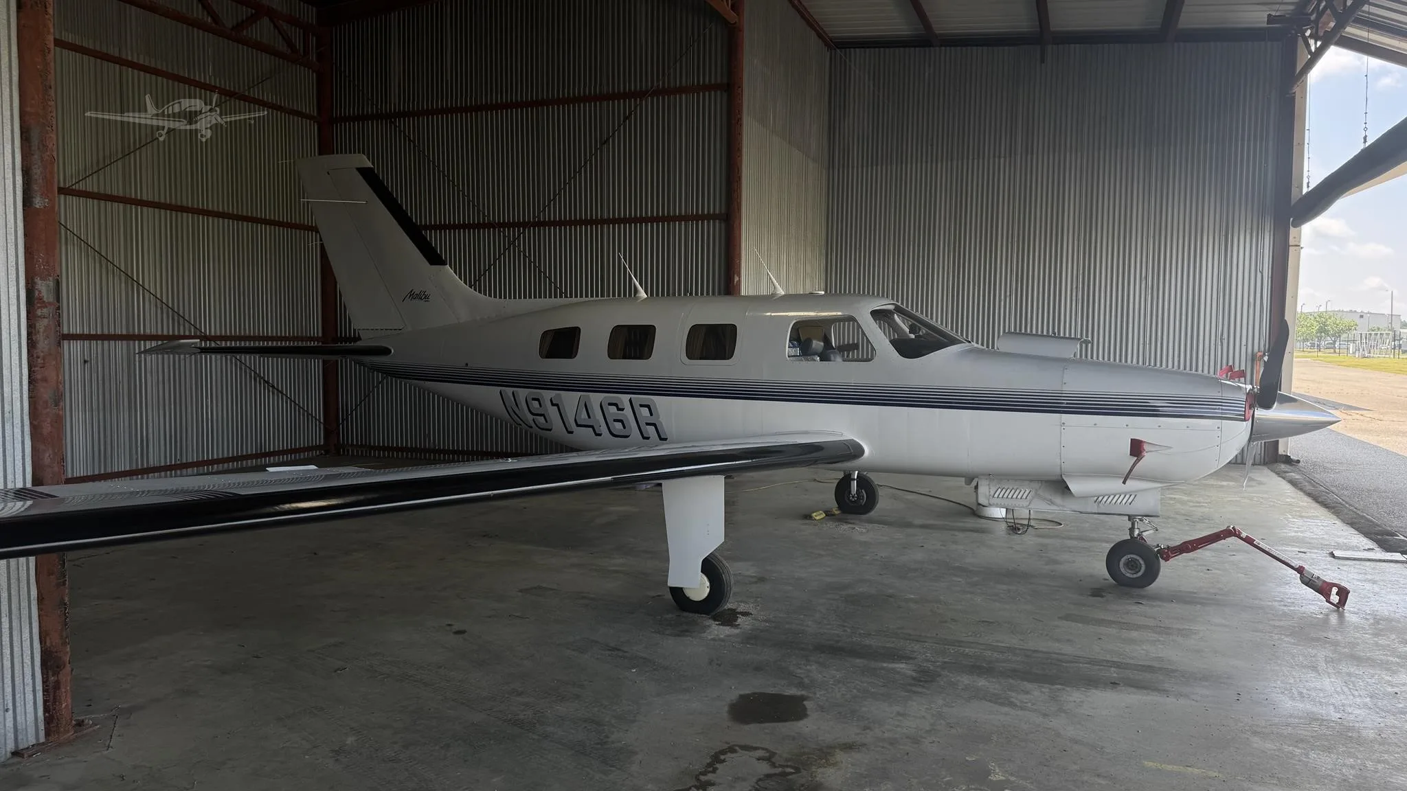 Exterior view of a 1988 PIPER MALIBU, N9146R.