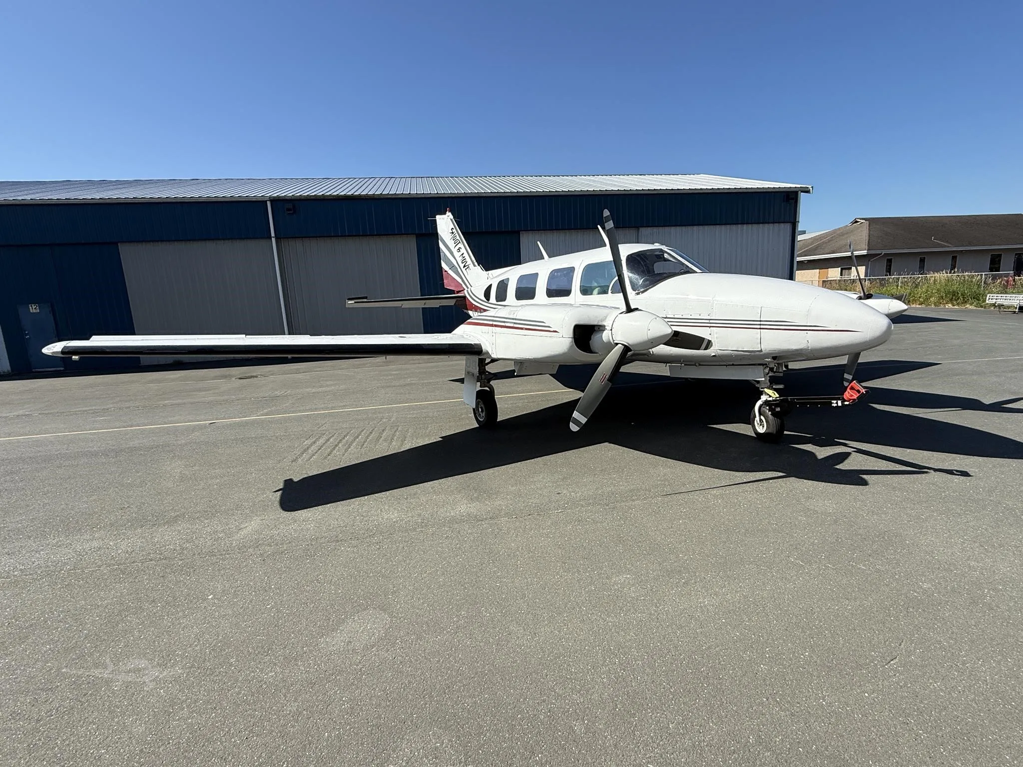 Exterior view of a 1968 PIPER NAVAJO, C-GDJR.