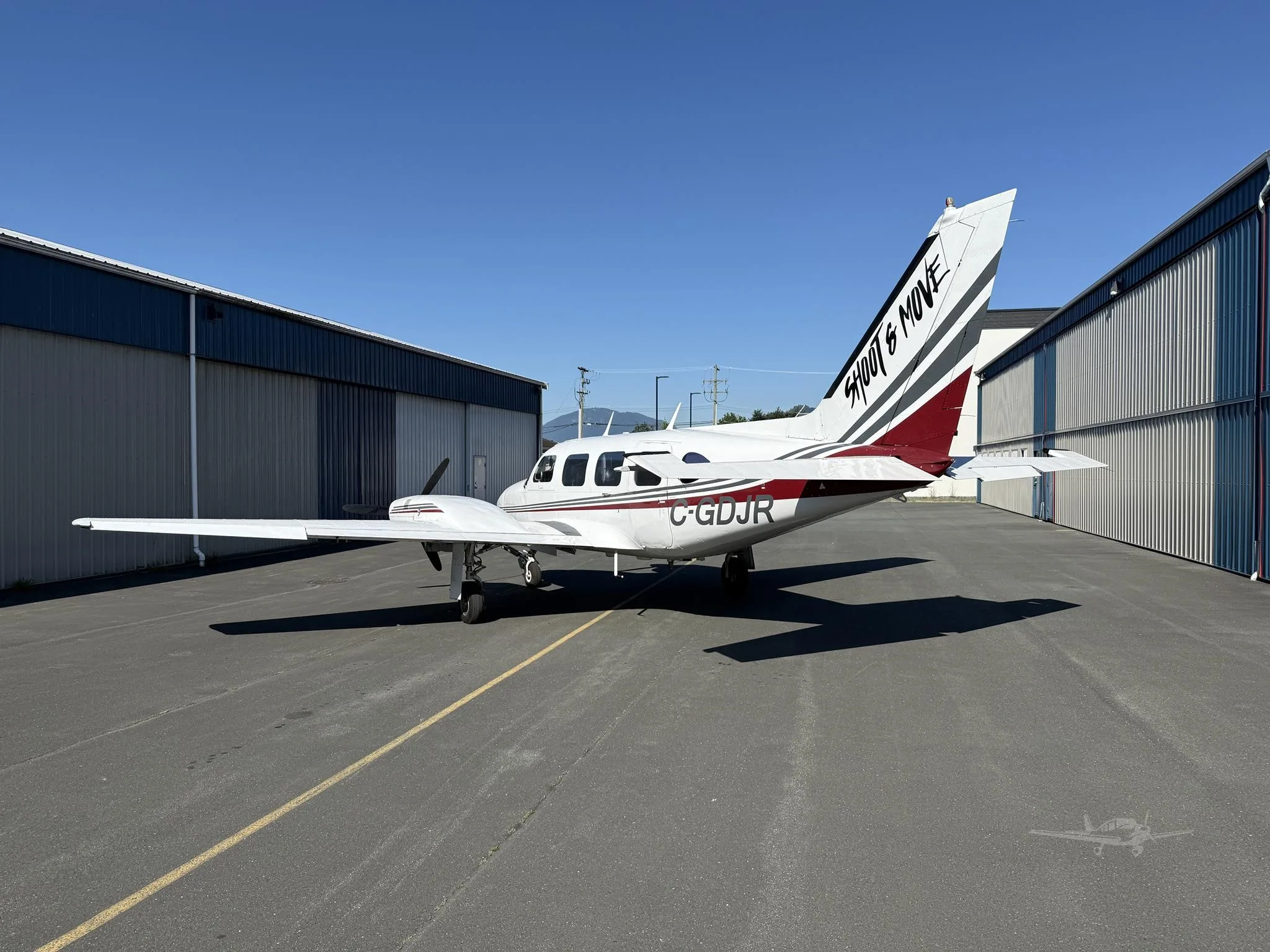 Exterior view of a 1968 PIPER NAVAJO, C-GDJR.