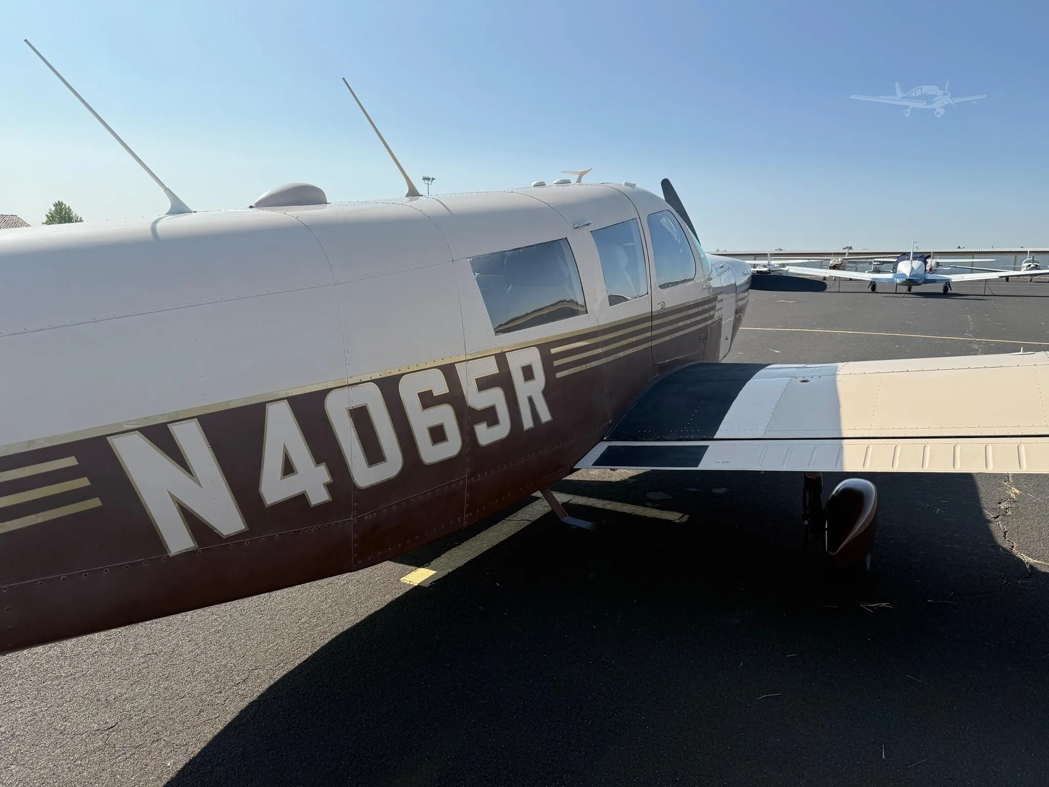 Exterior view of a 1967 PIPER CHEROKEE 6/300, N4065R.