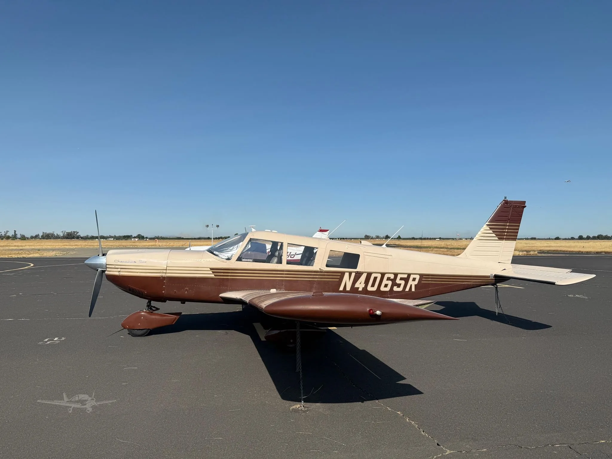 Exterior view of a 1967 PIPER CHEROKEE 6/300, N4065R.