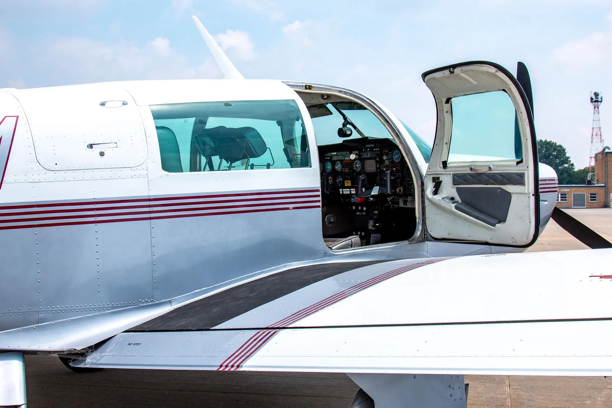 Exterior view of a 1984 MOONEY M20K 231, N5766M.