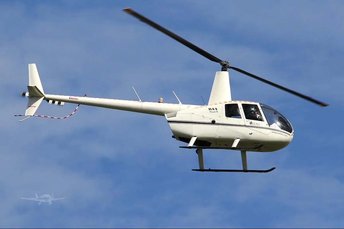 Marketing image of a 2010 ROBINSON R44 RAVEN II.